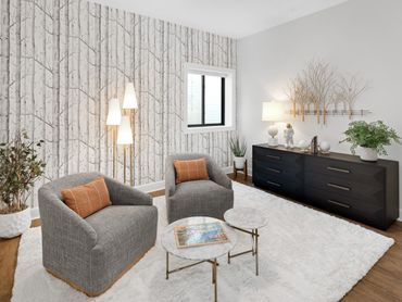 Sitting area with elegant wallpaper ID Cincinnati & Robert Lucke Homes showcased at Homearama 2024