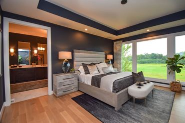 Bedroom by ID Cincinnati & Robert Lucke Homes, featuring design and ambiance at Homearama 2019