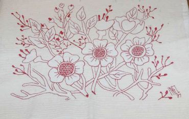 Dogwood embroidered pillow by Inez Running-rabbit.