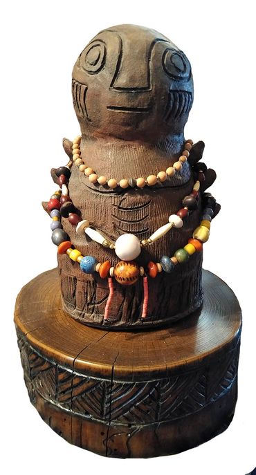 Necklace holder and beads and necklaces by Inez Running-rabbit.