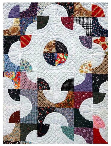 Close up of one of Inez Running-Rabbit's quilts.