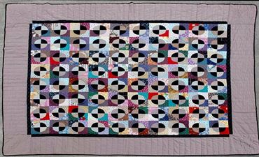 Hand made quilt by Inez Running-Rabbit.