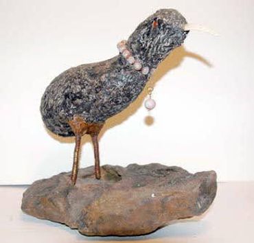 Bird sculpture by Inez Running-rabbit.
