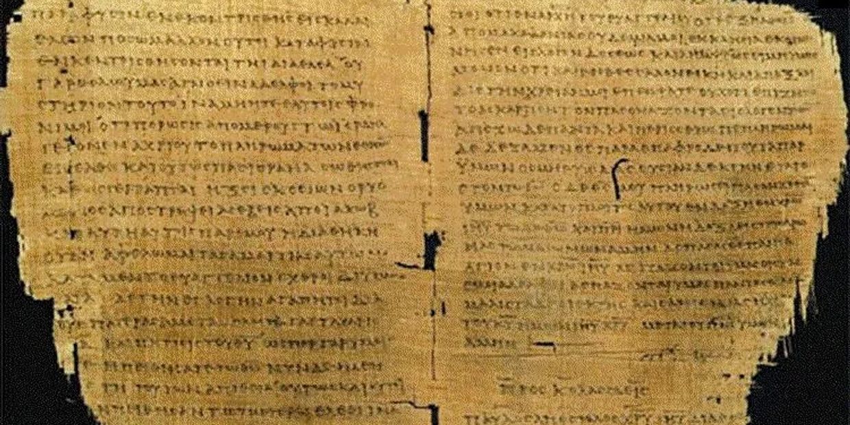 Ancient manuscript with faded script on aged parchment.