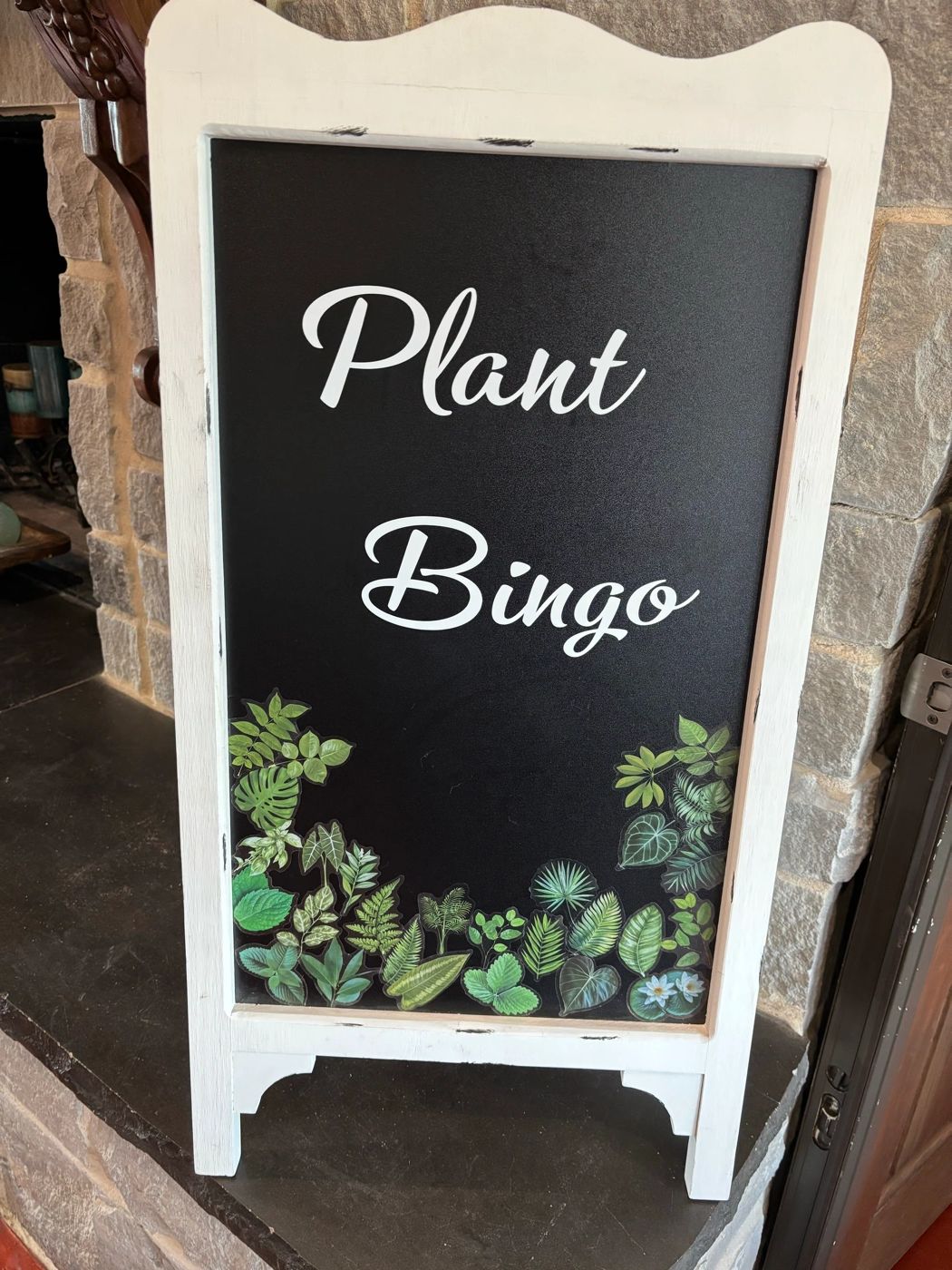 Plant Bingo welcome sign at a My Plant Wagon event, with a leafy botanical design.