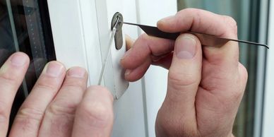 Locksmith picking lock