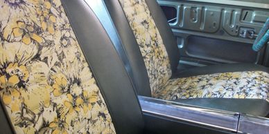 1969 Mod Top Barracuda front seats with OEM floral vinyl inserts 