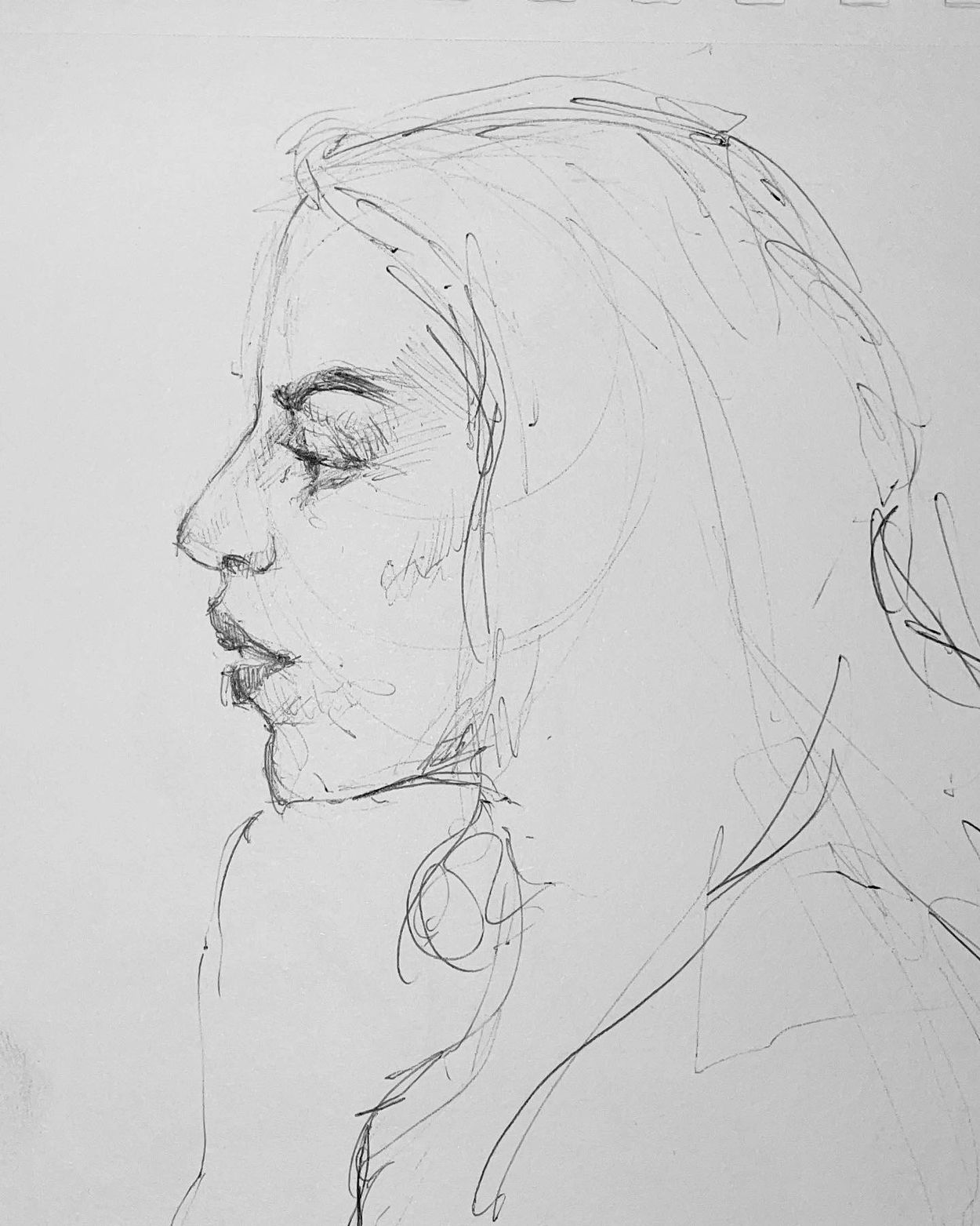 Pencil sketch of a woman's profile with soft, expressive lines.