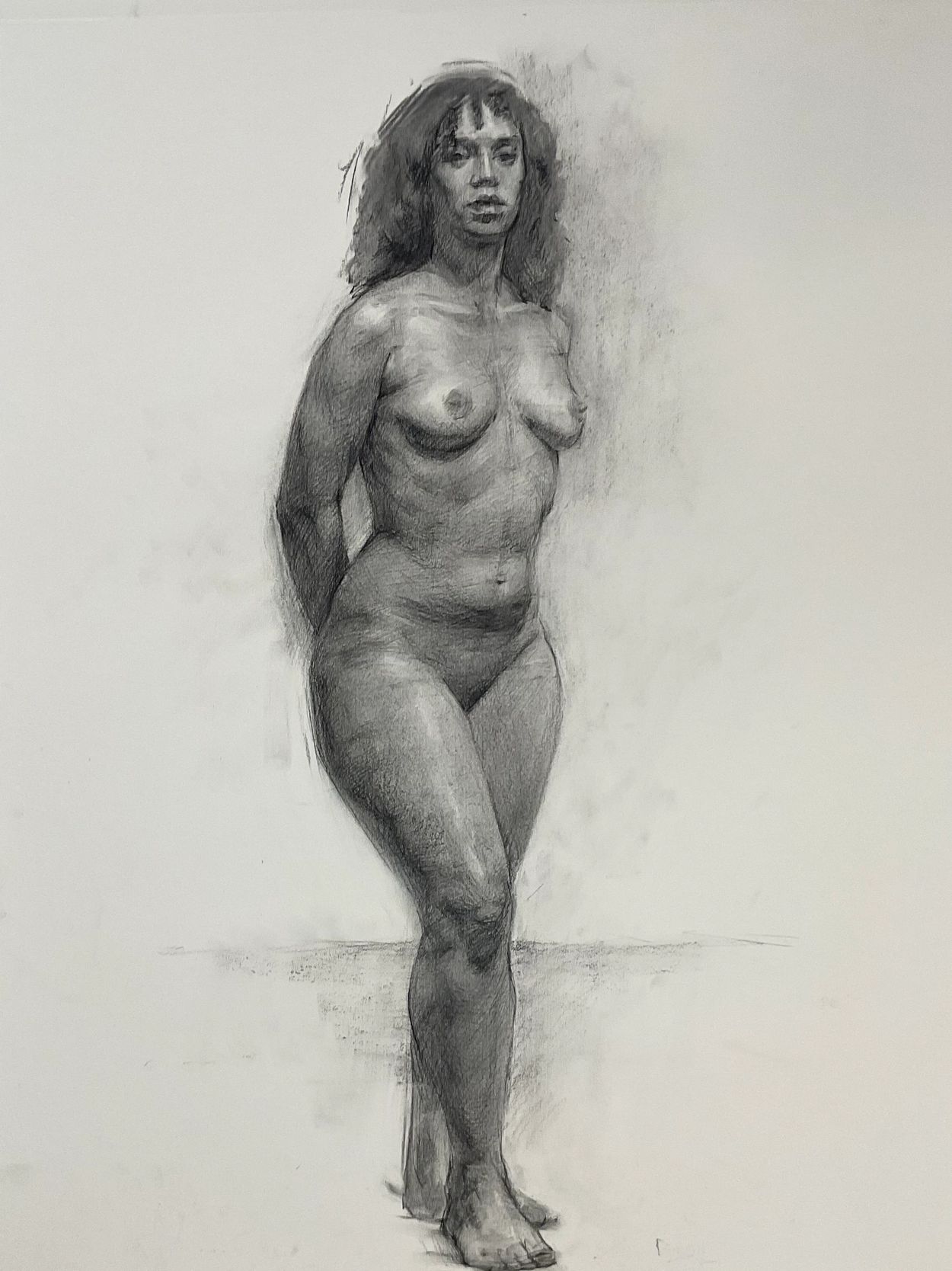 constructive drawing of nude woman standing, in charcoal on a toned paper
