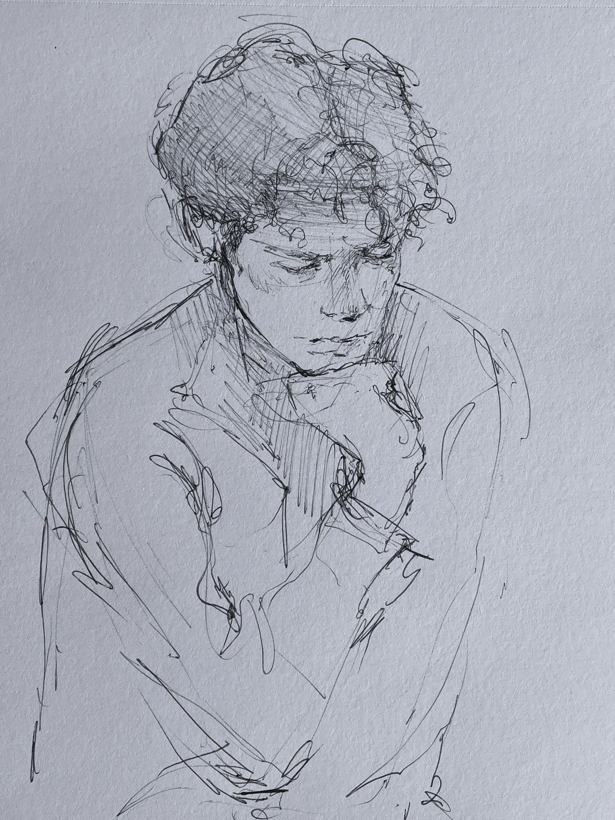 Pen sketch of a pensive person resting their chin on their hand.