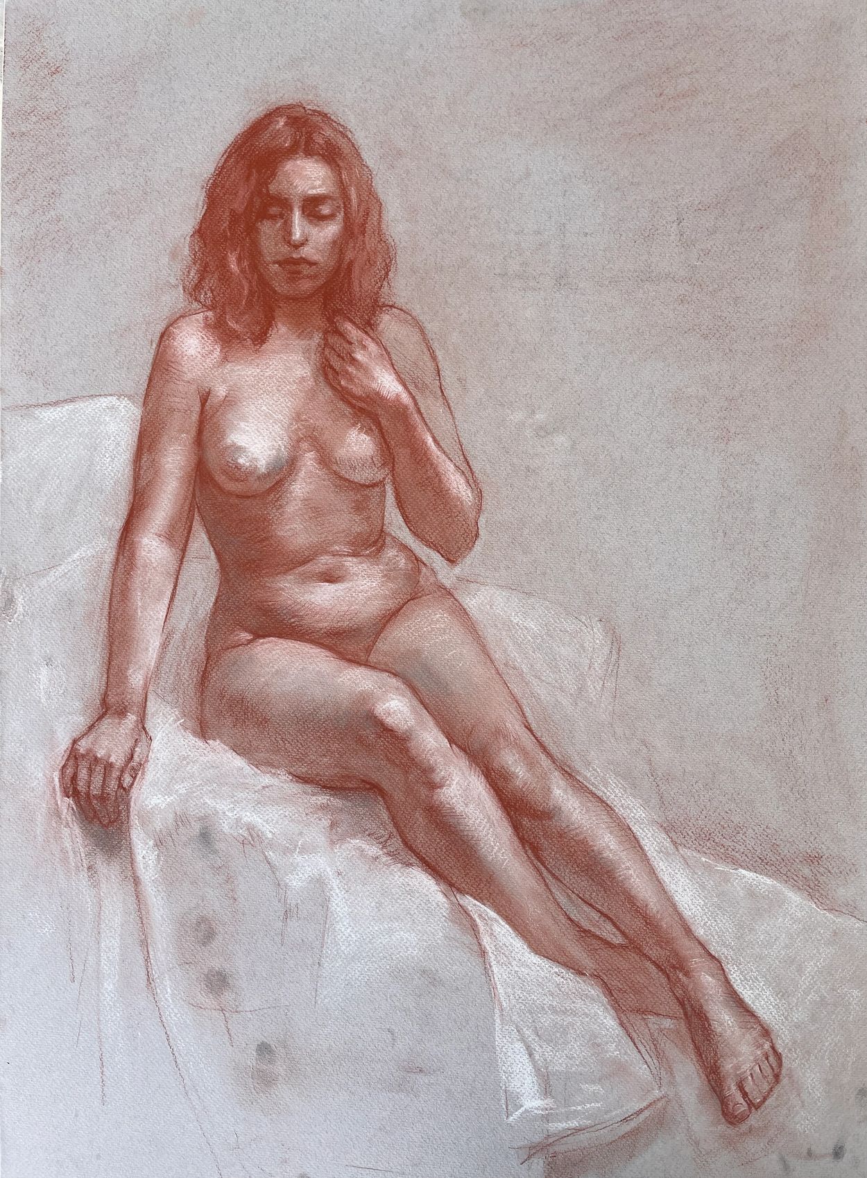 Woman drawing in sanguine reclining nude