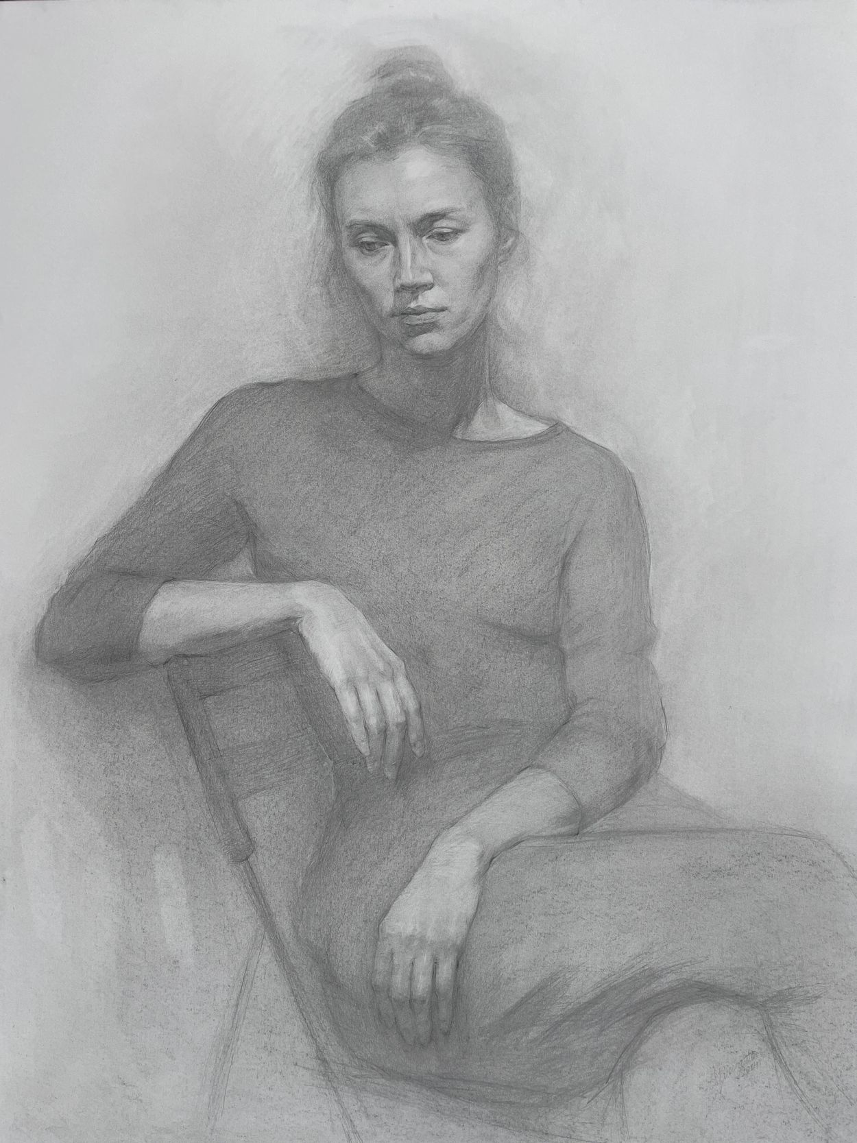 graphite drawing of serene woman sitting in contemplation