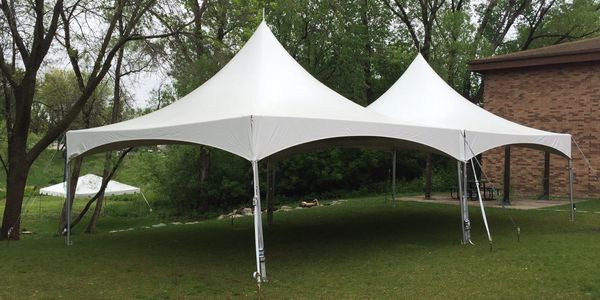20ftx40ft high peak canopy staked into grass
