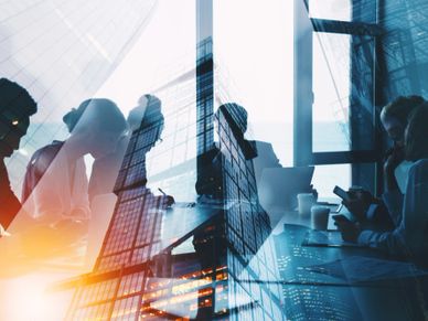 Silhouette of business people working together in the office.