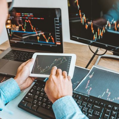 Businessman deals Investment stock market discussing graph stock market.