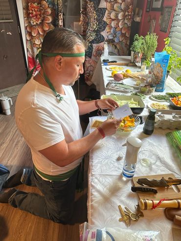 Jesse the spiritual healer is preparing his candle work.