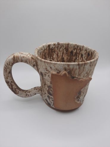 Do you love lattes so much that you would like a coffee cup that looks like a latte to hold a latte!