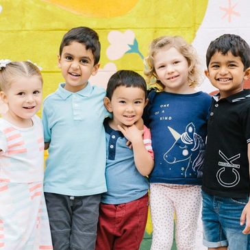 Five happy preschool children.