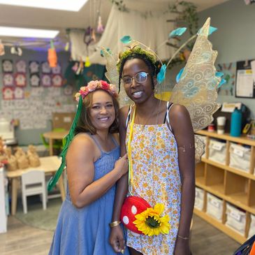 Two teachers dressed as fairies.