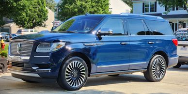 A freshly polished Lincoln Navigator.