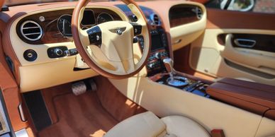 A Clean Bently interior shot from the driver side door.