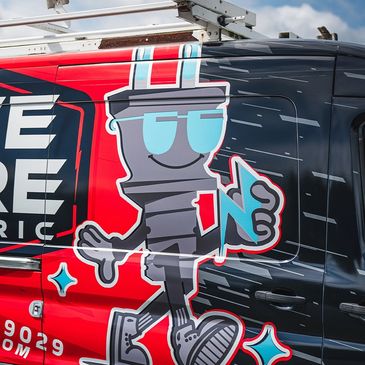 Live Wire Electric Ford Transit with a custom printed vinyl wrap