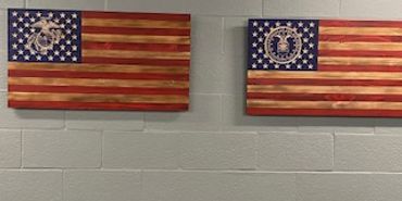 two military wooden flags