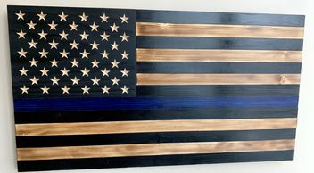 Our beautiful subdued Police Flag with the blue thin line and carved into the wood, not painted.