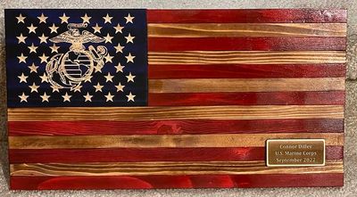 Marine Corps EGA flag with a plaque.