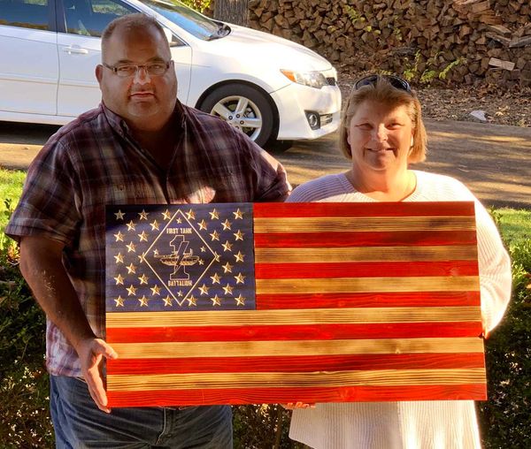 Marine Corps First Tank Battalion flag with carved stars and emblem;  Proud parents.