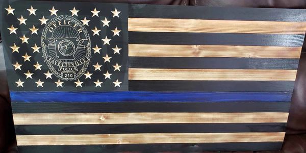 Blue thin line of Fayetteville, Arkansas police badge.