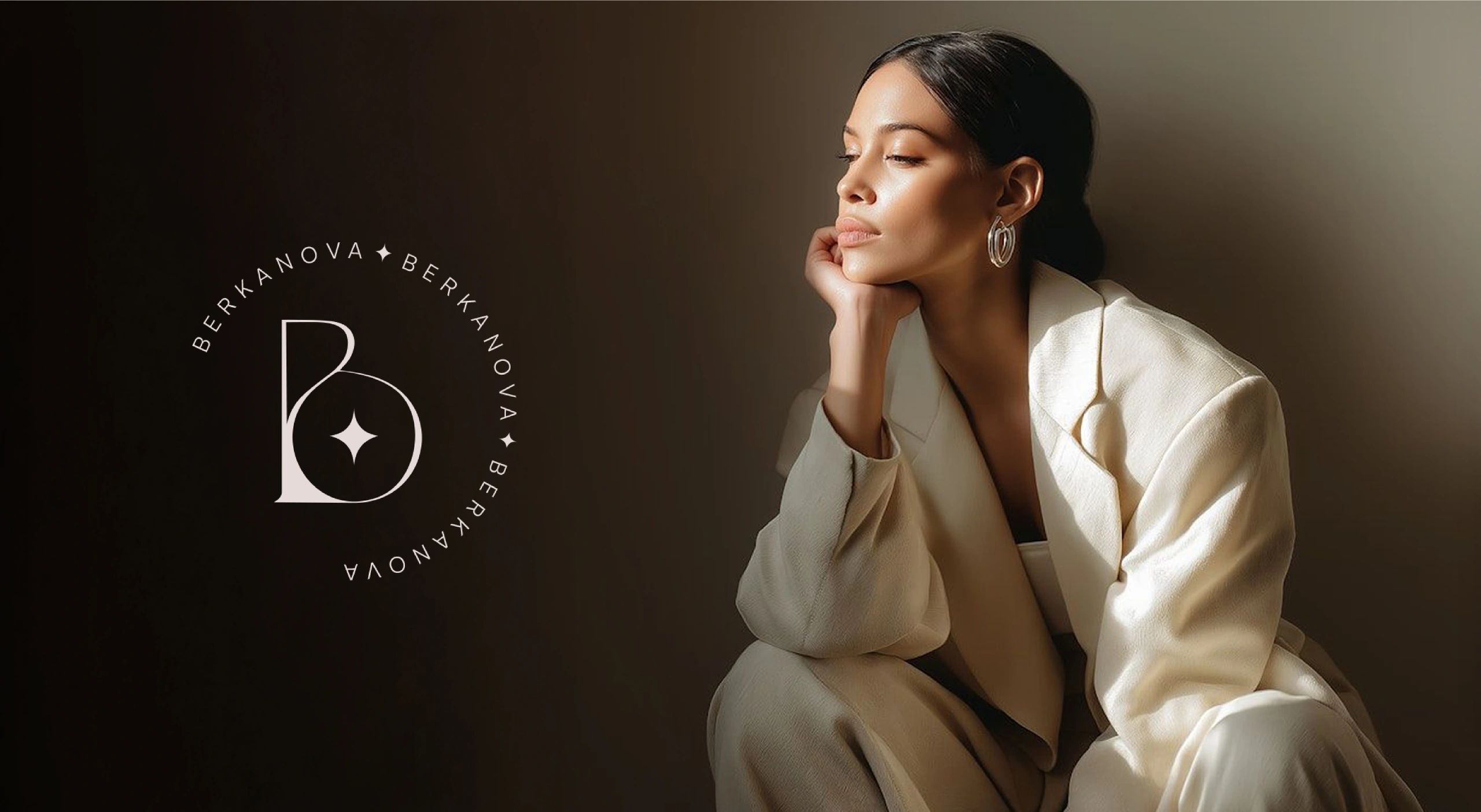 Elegant woman in cream suit poses thoughtfully beside Berkanova logo.
