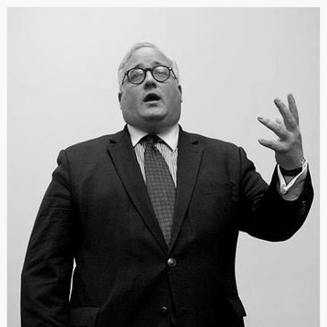 The founder of 104 London Debaters, Paul Carrol, in the process of giving a debate speech