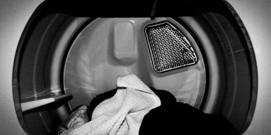 Laundry in a dryer.