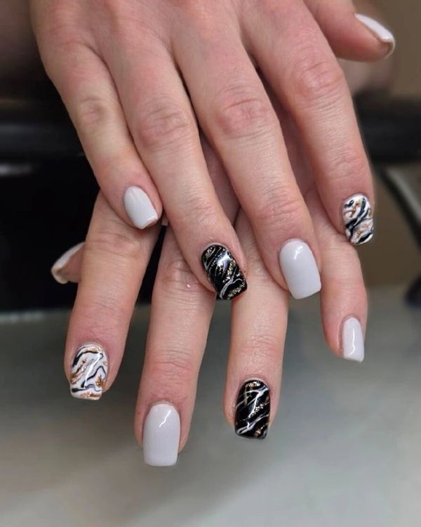 black and white nails with nail art