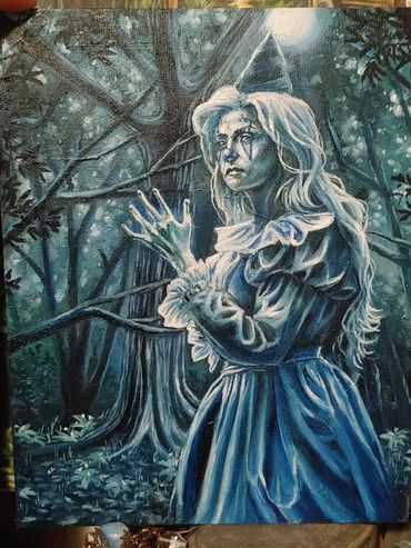 A lady clown in the deep woods with magic in her hands.