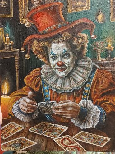 A clown tarot reader in a large hat.