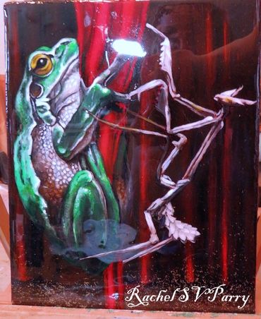 A frog and praying mantis climbing silks.