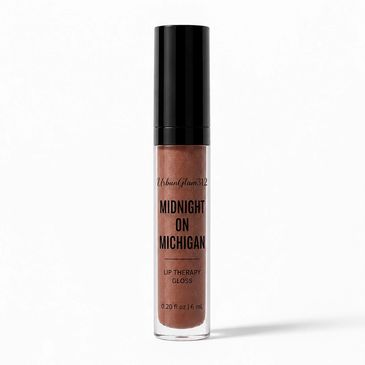 Lip therapy gloss named Midnight on Michigan in a sleek tube.