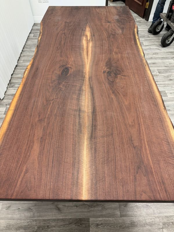 Live edge book matched Walnut conference table