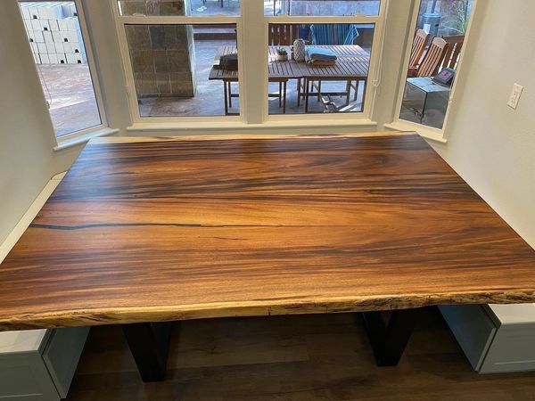 Bookmatched rain tree table with black