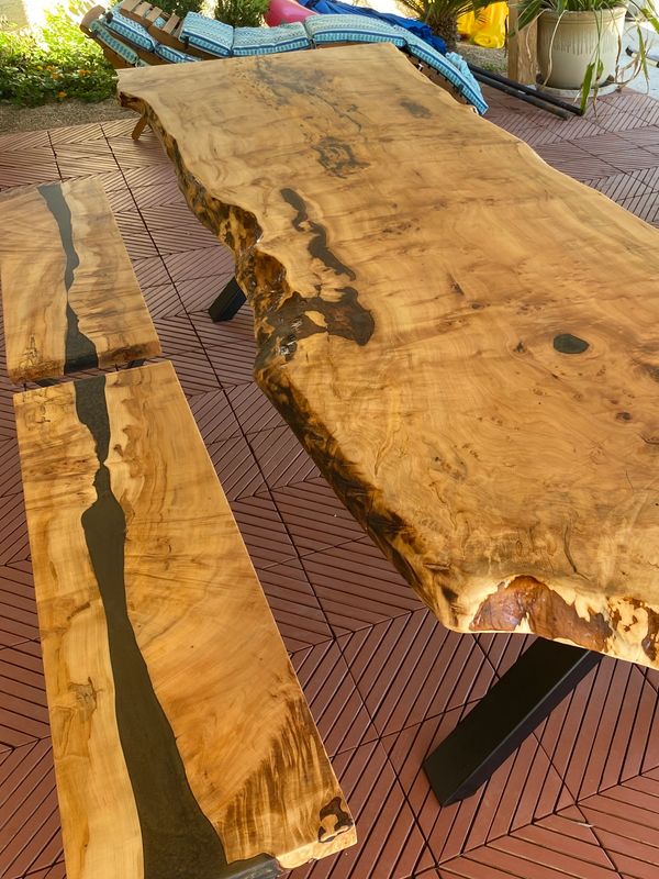 40x126” Ambrosia Maple live edge table and two 14x65” benches to match with charcoal epoxy
