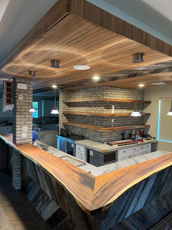 six 3” raintree shelves and enhanced with LED backlit Schluter