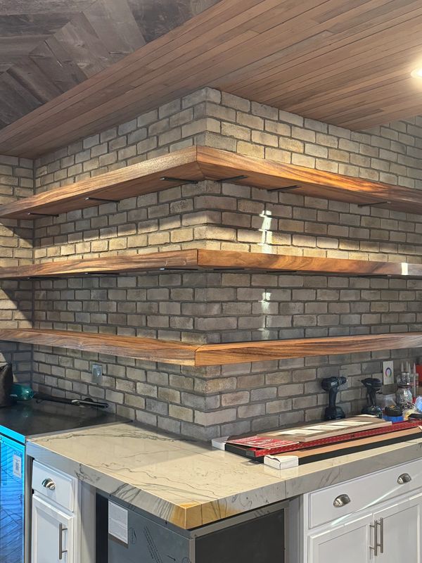 six 3” raintree shelves and enhanced with LED backlit Schluter