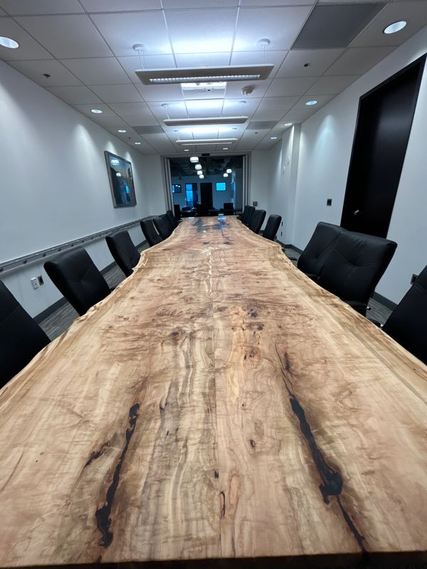 Very large 56-80”x 24 ft consecutive bookmatched whole Birds Eye figured maple log conference table