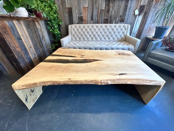 Cottonwood coffee table with double waterfall and aged bronze accents