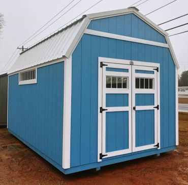 Bama Sheds 10x16 Barn style roof with transom windows in the doors and sidewalls. 
