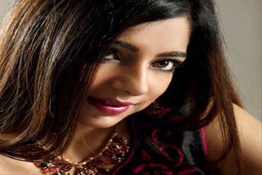 Nichelle Asian Indian Bollywood female singer at a photo shoot