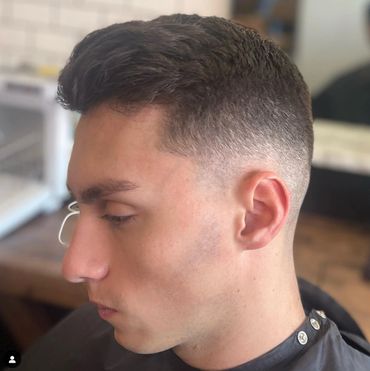 skin faded haircut with a razor neck shave to finish
