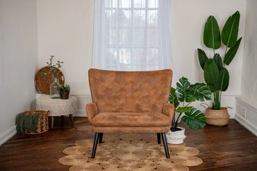 An image of a boho style room, neutral in color and varying textures. Used for content creators